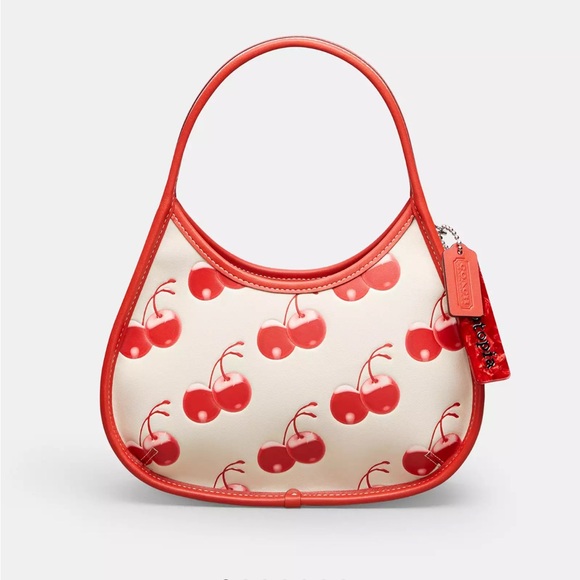 Coach Handbags - Coach Ergo Shoulder Bag In Coachtopia Leather With Cherry Print